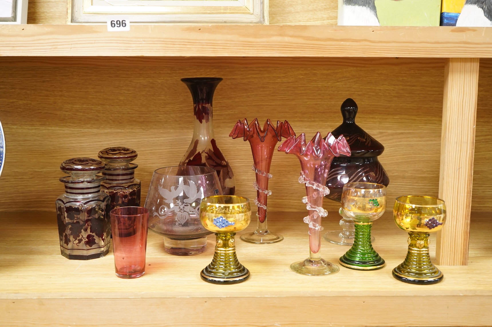 A collection of 19th century and later glassware to include three goblets, a pair of vases with trailed decoration and a Caithness glass vase, largest 28cm high
